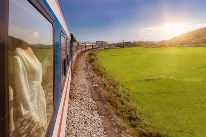 a woman standing on a train