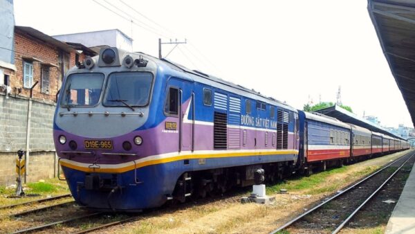 Family-express-train-from-hanoi-to-sapa - a train on the tracks